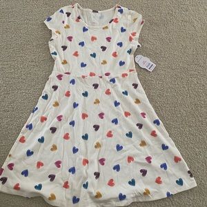 White dress with multi-coloured hearts (L/G 10-12)